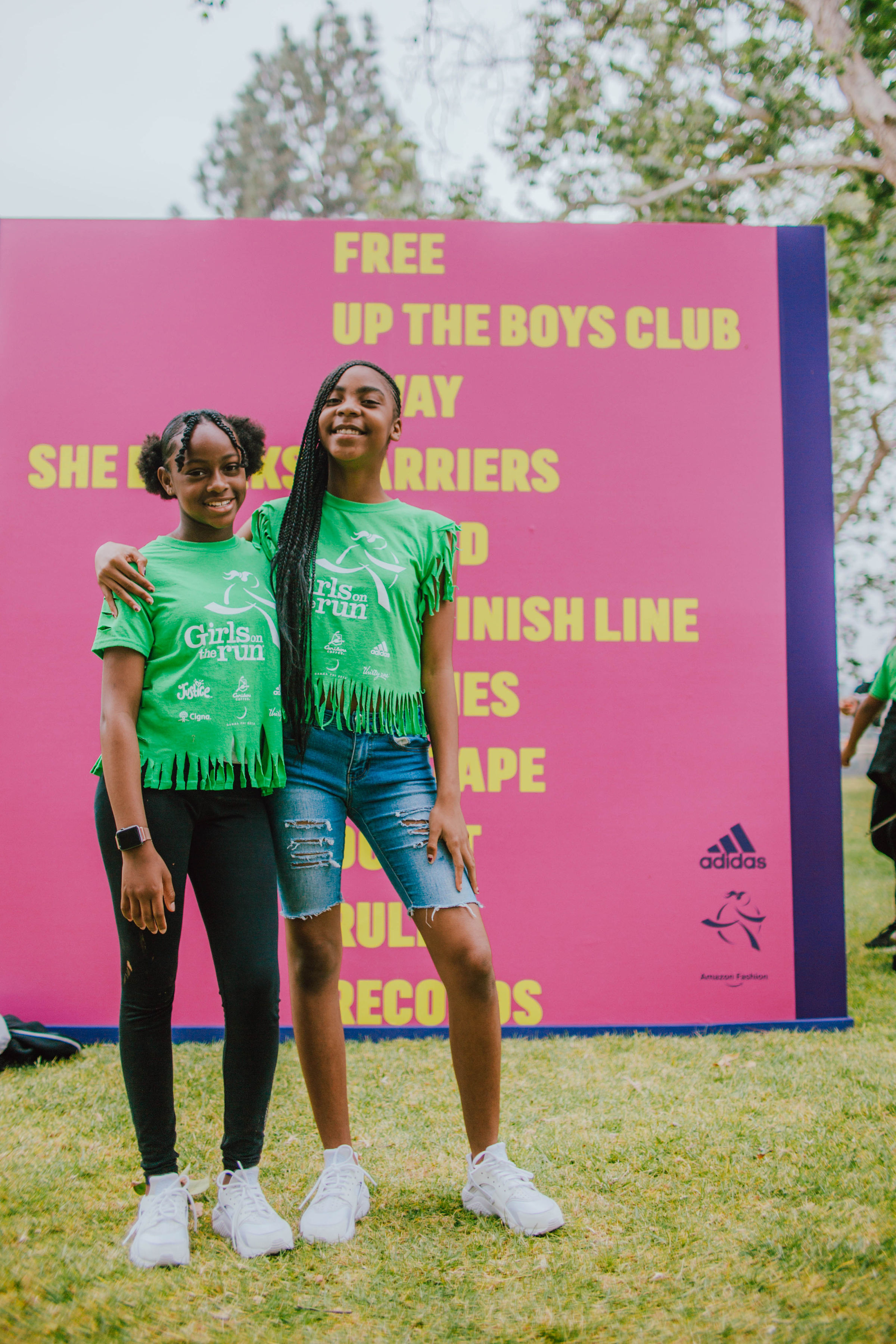 Two Girls on the Run participant both smile with an arm around each other